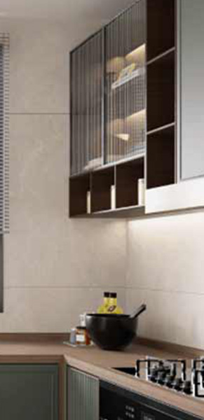 Compact yet elegant Casa Homes kitchen showcasing vertical storage, light wood cabinets, and a cozy breakfast nook bathed in natural light, ideal for urban living.